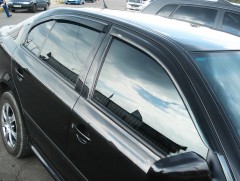 Дефлектори вікон для Skoda Octavia '97-09, хетчбек, 4 шт. (Hic)